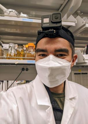 Adam Steinbrenner, wearing a face mask and GoPro camera.