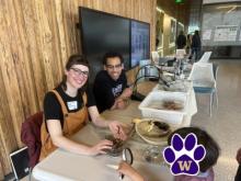 Young scientist learning about invertebrates with Assistant Teaching Professors Camila Lopez-Anido and Terence Leach