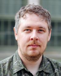 Portrait of <a href="/people/adam-blake" hreflang="und">Adam Blake</a>